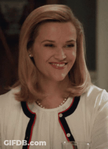 Woman In Pink Dress Talking To Man In Yellow Shirt GIF