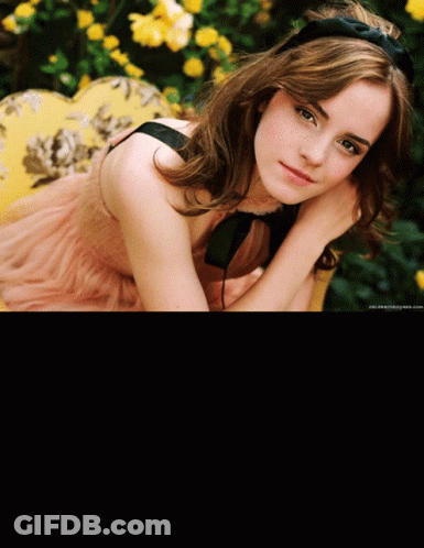 Woman In Pink Dress With Black Bow GIF