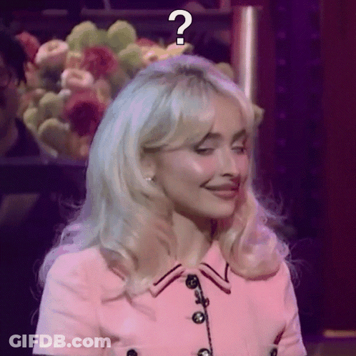 Woman In Pink Dress With Question Mark GIF