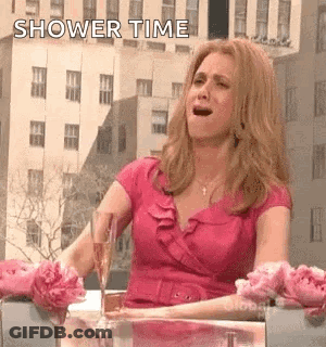 Woman In Pink Dress With Wine And Flowers GIF