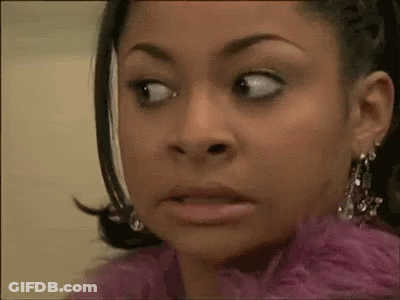 Woman In Pink Feather Boa Making Funny Face GIF