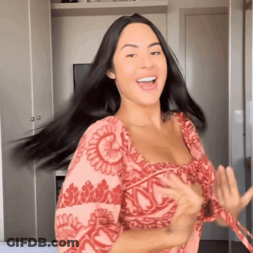 Woman In Pink Floral Dress GIF