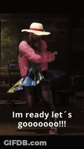 Woman In Pink Fur Coat And Rainbow Dress Says I'm Ready Let's Gooooooo GIF
