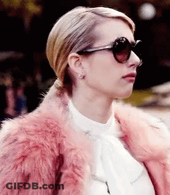 Woman In Pink Fur Coat And Sunglasses GIF