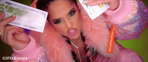 Woman In Pink Fur Coat Holding $10 Bill GIF