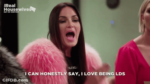 Woman In Pink Fur Coat Says I Can Honestly Say I Love Being LDS GIF