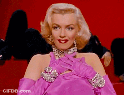 Woman In Pink Gloves And Pink Dress GIF