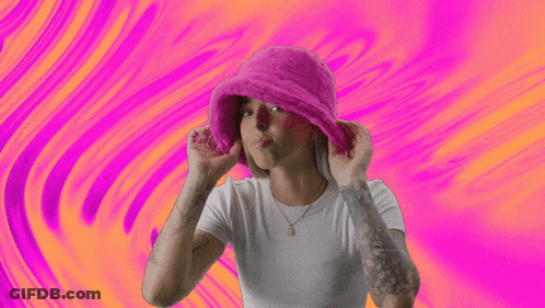 Woman In Pink Hat Making Funny Face GIF