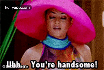 Woman In Pink Hat Saying You're Handsome GIF