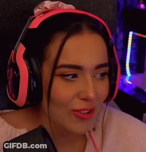 Woman In Pink Headphones At Microphone GIF