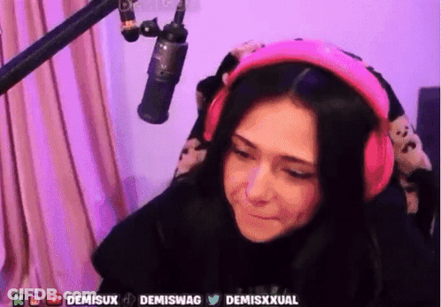 Woman In Pink Headphones Crying GIF