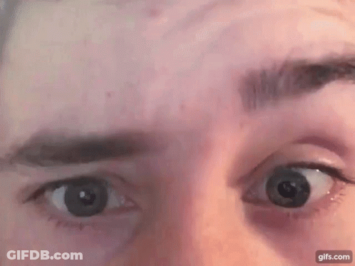 Woman In Pink Hoodie Close Up GIF