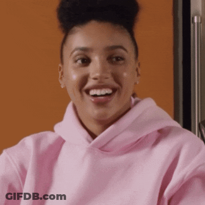 Woman In Pink Hoodie Smiling With Mouth Open GIF