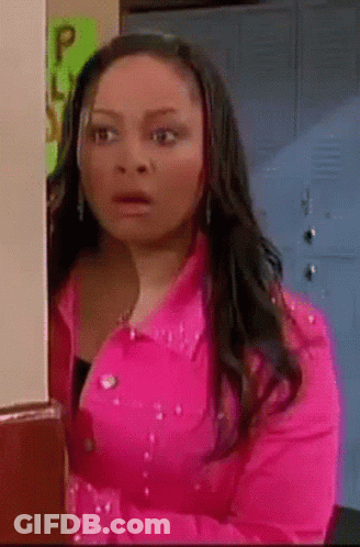 Woman In Pink Jacket At Lockers GIF