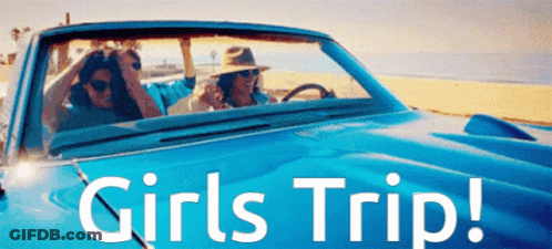 Woman In Pink Jacket Holding Glass In Club GIF