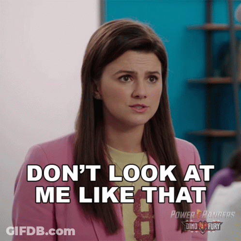 Woman In Pink Jacket Saying Don't Look At Me GIF