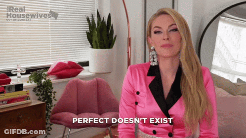 Woman In Pink Jacket Says Perfect Doesn't Exist GIF