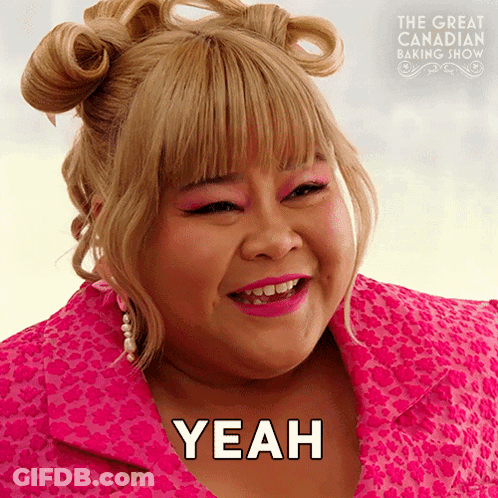 Woman In Pink Jacket Says Yeah In Front Of The Great Canadian Baking Show Poster GIF