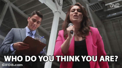 Woman In Pink Jacket Singing Into Microphone GIF