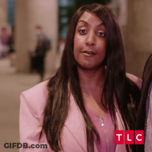 Woman In Pink Jacket With TLC GIF