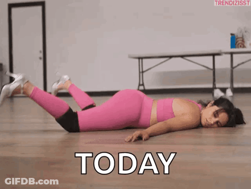Woman In Pink Leggings Lying Down GIF
