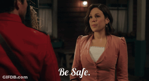 Woman In Pink, Man In Red, Be Safe GIF