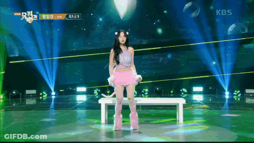 Woman In Pink Outfit On Stage With KBS GIF