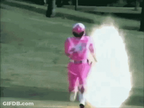 Woman In Pink Power Ranger Costume Walking GIF