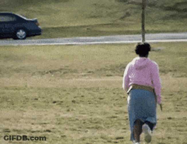 Woman In Pink Running Away GIF