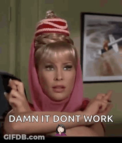 Woman In Pink Scarf Damn It Doesn't Work GIF