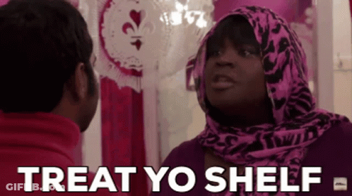 Woman In Pink Scarf Talking To Man In Red Jacket GIF