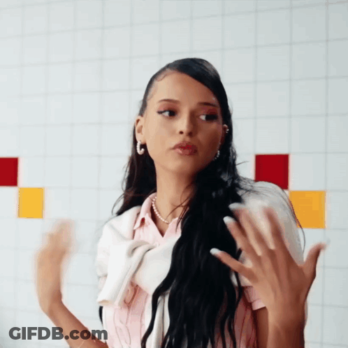 Woman In Pink Shirt And White Sweater GIF