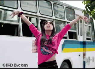 Woman In Pink Shirt By Bus Number 4 GIF