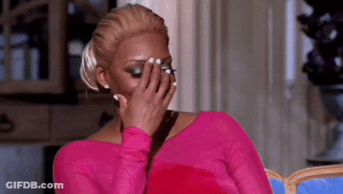 Woman In Pink Shirt Covering Face GIF