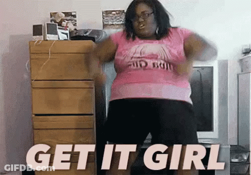 Woman In Pink Shirt Dancing In Front Of Get It Girl Sign GIF