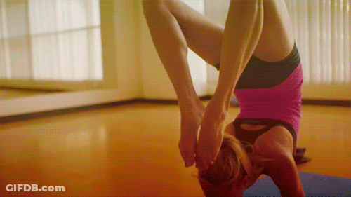 Woman In Pink Shirt Doing Handstand GIF