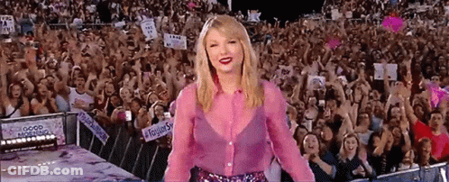 Woman In Pink Shirt Holding Good Morning Sign GIF