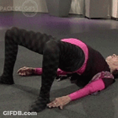 Woman In Pink Shirt Kneeling GIF