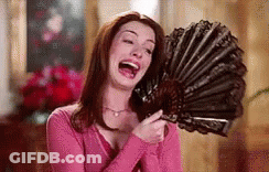 Woman In Pink Shirt Laughing Holding Fan GIF