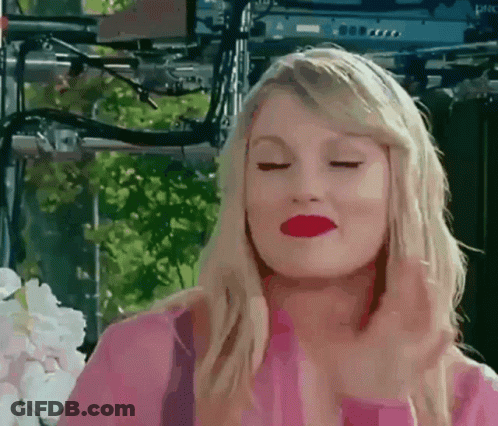Woman In Pink Shirt Making Face GIF