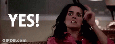 Woman In Pink Shirt Making Funny Face Saying Yes GIF