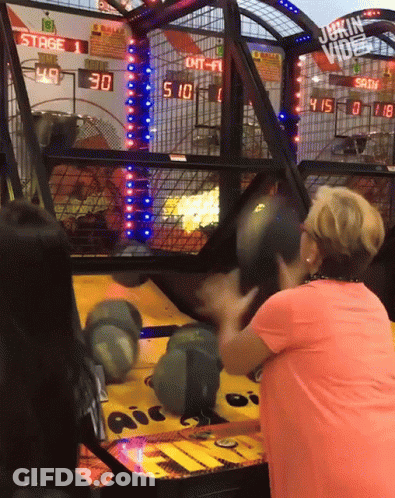 Woman In Pink Shirt Playing Game Scoreboard Stage 1 GIF