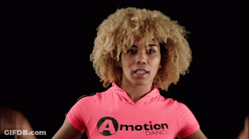 Woman In Pink Shirt Saying A Motion Dance GIF