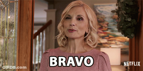 Woman In Pink Shirt Saying Bravo GIF