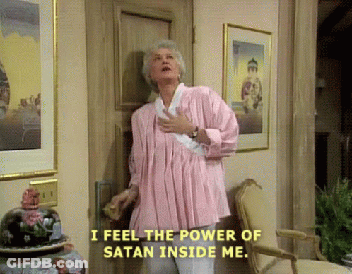 Woman In Pink Shirt Saying I Feel The Power Of Satan Inside Me GIF