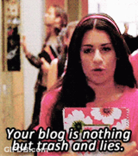 Woman In Pink Shirt Saying Your Blog Trash And Lies GIF