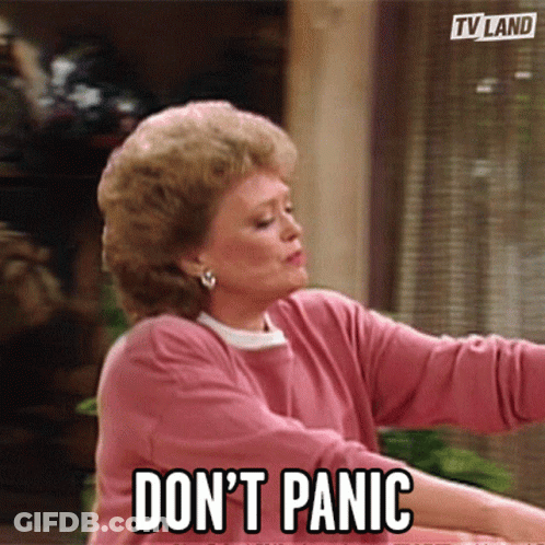 Woman In Pink Shirt Says Don't Panic GIF
