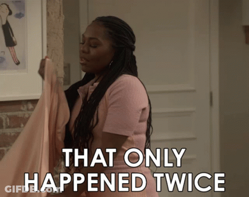 Woman In Pink Shirt Says That Only Happened Twice Holding Cloth GIF