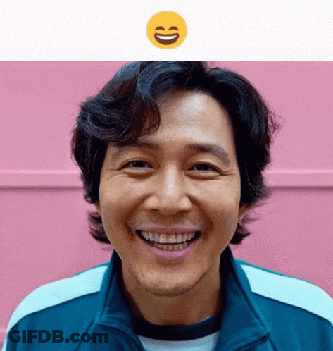 Woman In Pink Shirt Smiling At HBO Sign GIF