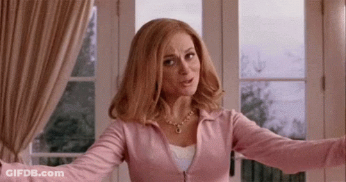 Woman In Pink Shirt Standing With Arms Outstretched GIF